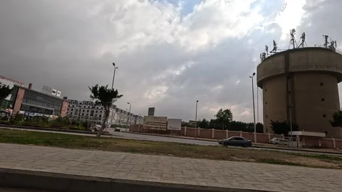 Driving Through Elegant Urban Streets New Cairo Showing Modern Buildings Traffic Stock Footage 330093922