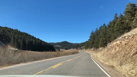 Driving through empty Colorado mountain roads Stock Footage 99792122
