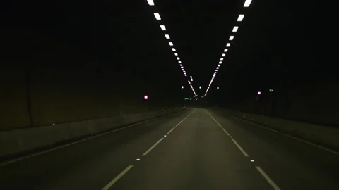 Driving through empty road tunnel Stock Footage 137000413