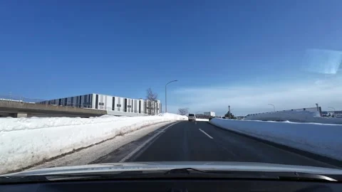 Driving through ETC toll gate snowy expressway Sapporo Japan Vídeos de archivo 333229702