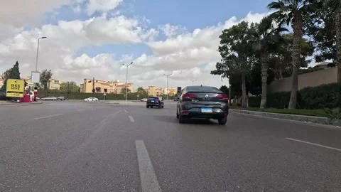 Driving Through Expanding City District Roads New Cairo Showing Buildings Stock-Footage 329655696