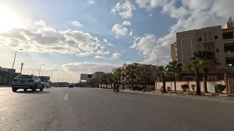 Driving Through Expansive Streets New Cairo Showing Modern Buildings Traffic And Stock Footage 329725842