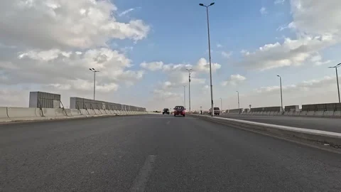 Driving Through Expansive Urban District Roads New Cairo Showing Buildings Stock Footage 329661060