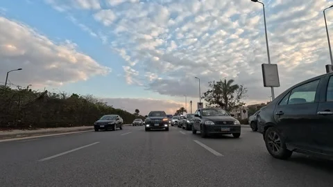 Driving Through Expansive Urban District Roads New Cairo Showing Buildings Stock-Footage 329952667