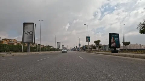 Driving Through Expansive Urban District Roads New Cairo Showing Buildings Stock Footage 330113538