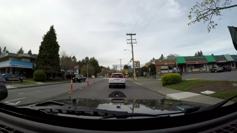 Driving through Feltham intersection on Shelbourne Stock Footage 178261992