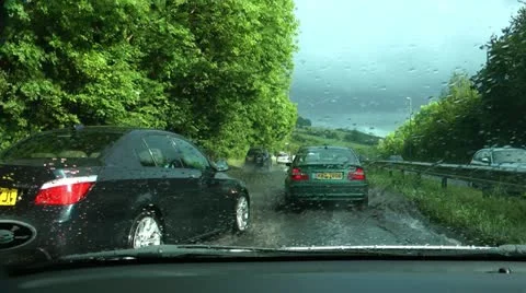 Driving through flood after thunderstorm 動画素材 12401084