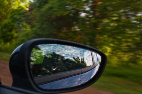 Driving through the forest by car Stock Photos