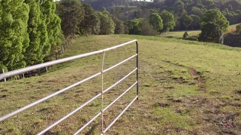 Driving through gate on rural property Stock-Footage 74475738