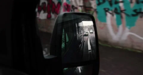 Driving through germany in a dark van watching from a rear view mirror Stock Footage 230317938