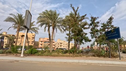 Driving Through Green Urban District New Cairo Showing Buildings Traffic Stock Footage 329767993