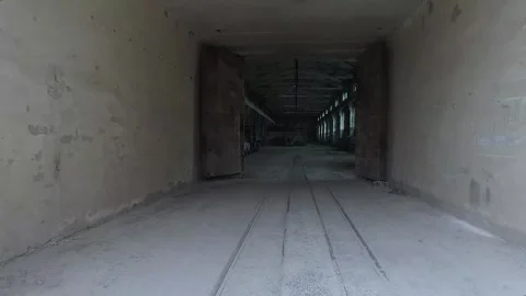 Driving through the grounds of an old abandoned factory. Stock Footage 252129439