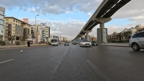 Driving Through Growing City District Roads New Cairo Showing Buildings Traffic 動画素材 329752175
