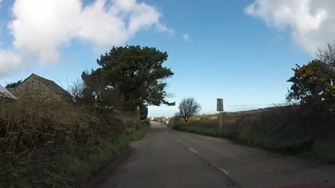 Driving through Halsetown into St Ives Stock Footage 254591129