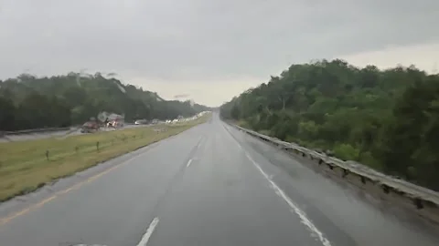 Driving through heavy rain on an empty highway Stock Footage 281764182
