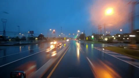 Driving through heavy rain on the road Stock Footage 282603725