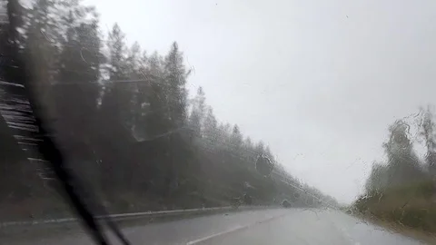 Driving through heavy rain storm epic road travel Stock Footage 123385113