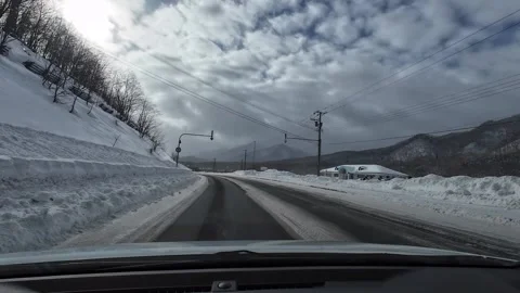 Driving Through High Snow Walls on Curved Road Hokkaido Japan Vídeo Stock 333369910