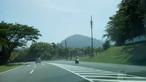 Driving through hills landscape Stock Footage 276829433