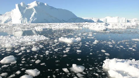 Driving through ice in arctic waters on a sunny day Stock Footage 33910822