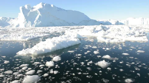 Driving through ice in arctic waters on a sunny day Stock Footage 33910825