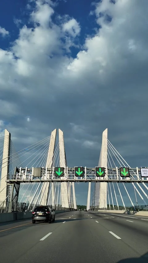 Driving Through the Iconic Governor Mario M. Cuomo Bridge on a Sunny Day Stock Footage 280346454