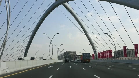 Driving through the Infinity Bridge in Dubai, UAE Stock Footage 327388593