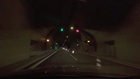 Driving through long tunnel Stock Footage 327388674