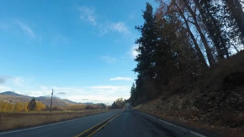 Driving through the Methow Valley on a clear fall day Stock-Footage 97599555