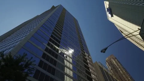 Driving through midtown Chicago looking up at the buildings. Stock Footage 70707962