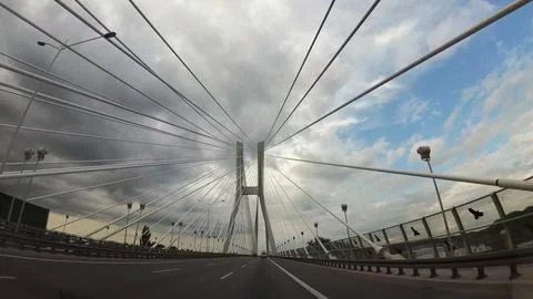 Driving Through Modern Cable-Stayed Bridge Dash Cam POV Stock Photos