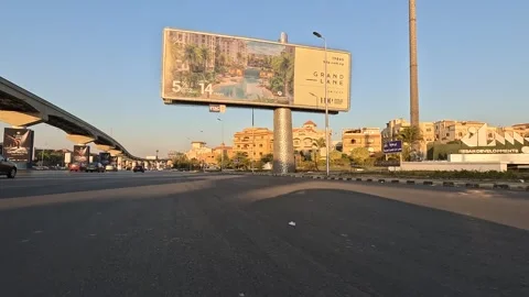 Driving Through Modern City District Roads New Cairo Showing Buildings Traffic Stock Footage 329785378