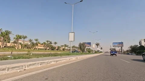 Driving Through Modern City District Roads New Cairo Showing Buildings Traffic Stock Footage 329806472