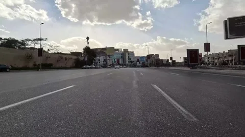 Driving Through Modern City Roads New Cairo Showing Buildings Traffic And Urban Stock Footage 329659685