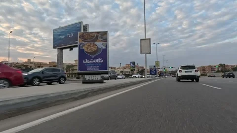 Driving Through Modern Planned Streets New Cairo Showing Buildings Traffic Stock-Footage 329946062