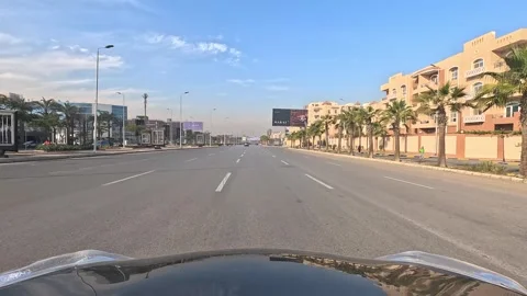 Driving Through Modern Roads New Cairo Showing Buildings Traffic And Daily City Stock-Footage 329655248