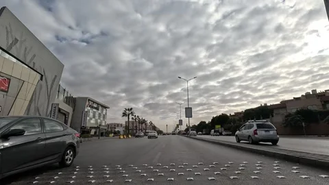 Driving Through Modern Roads New Cairo Showing Buildings Traffic And Daily City Vídeo Stock 329701112