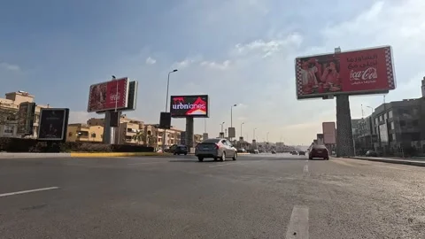 Driving Through Modern Urban District Streets New Cairo Showing Buildings Stock Footage 329885867