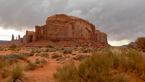 Driving Through Monument Valley Past Iconic Rock Formations Stock Footage 309049696