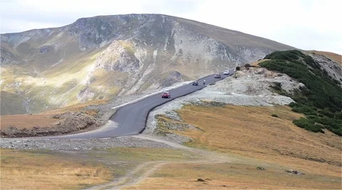 Driving through a mountain road  Stock Footage 59938559