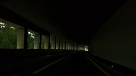 Driving Through Mountain Road Tunnel With Passing Cars Stock Footage 342751435