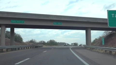 Driving through a mountainous area in Arizona with winding roads in slow mo.. Stock Footage 280162898