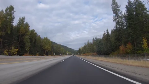 Driving through the mountains on a crisp fall day in the Idaho panhandle Stock-Footage 96726951