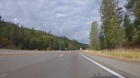 Driving through the mountains on a crisp fall day in the Idaho panhandle Stock-Footage 96765233