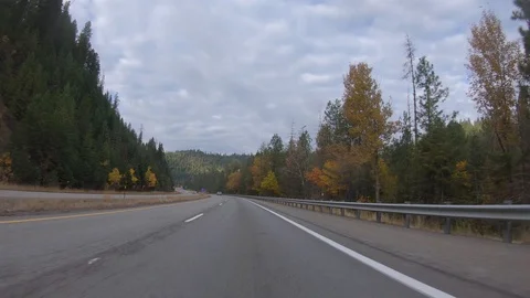 Driving through the mountains on a crisp fall day in the Idaho panhandle Stockbeeldmateriaal 96765272
