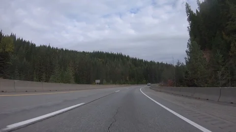 Driving through the mountains on a crisp fall day in the Idaho panhandle Stock-Footage 96765808