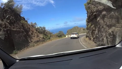 Driving through the mountains on the road in Anaga Nature Reserve Tenerife Spain Video stock 80799842
