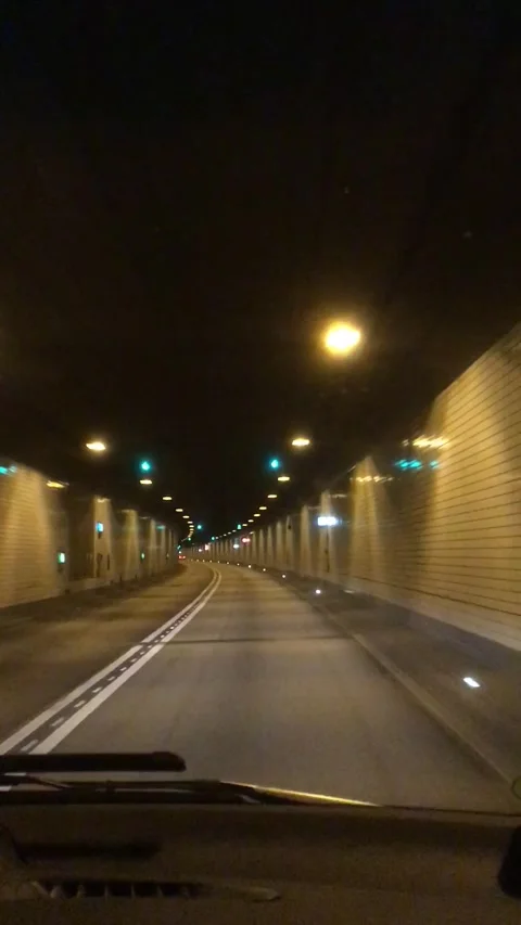 Driving Through Multi Lane Elbtunnel With Illuminated Ceiling Lights in Hamburg Stock Footage 341681192
