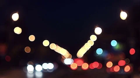 Driving through the night city in the defocus Stock Footage 80232239