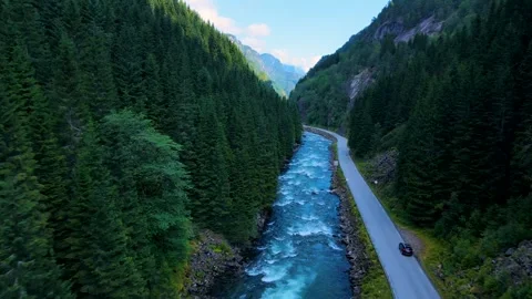 Driving Through Norway: River and Valley Scenic Route Stock Footage 282396480